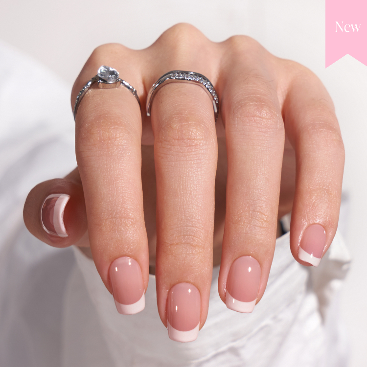 Short French tip stick on nails with pink base and white square tips